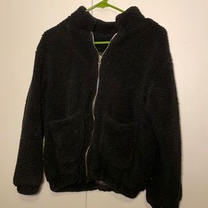 Two pocket black sinched waist zip up jacket